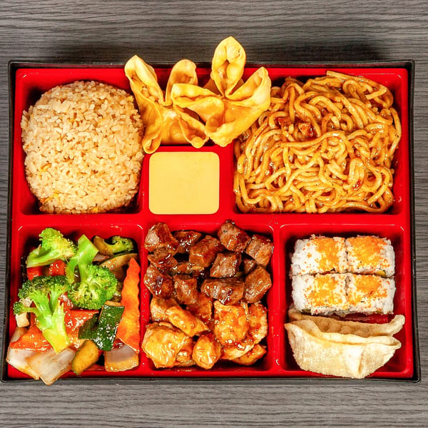 A bento box filled with fried rice, lo mein, crab rangoons, mixed vegetables, beef, chicken, sushi, and a dumpling.